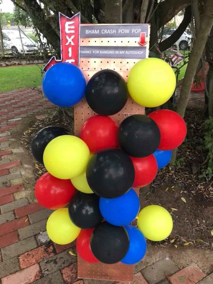 A sign with text and balloons attached to it at The Barn on Boundary Party Venue Johannesburg.