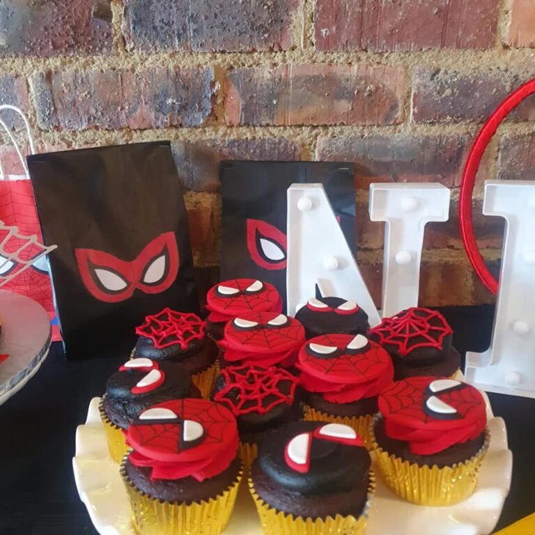 Spider-Man themed cupcakes and party bags displayed against a brick wall at the Barn on Boundary Party Venue in Johannesburg, Northriding.