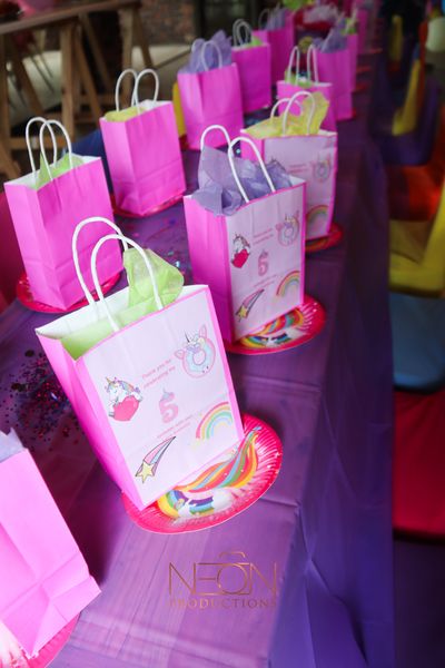Colorful party favor bags and plates arranged on a table at the Barn on Boundary Party Venue in Johannesburg, Northriding.